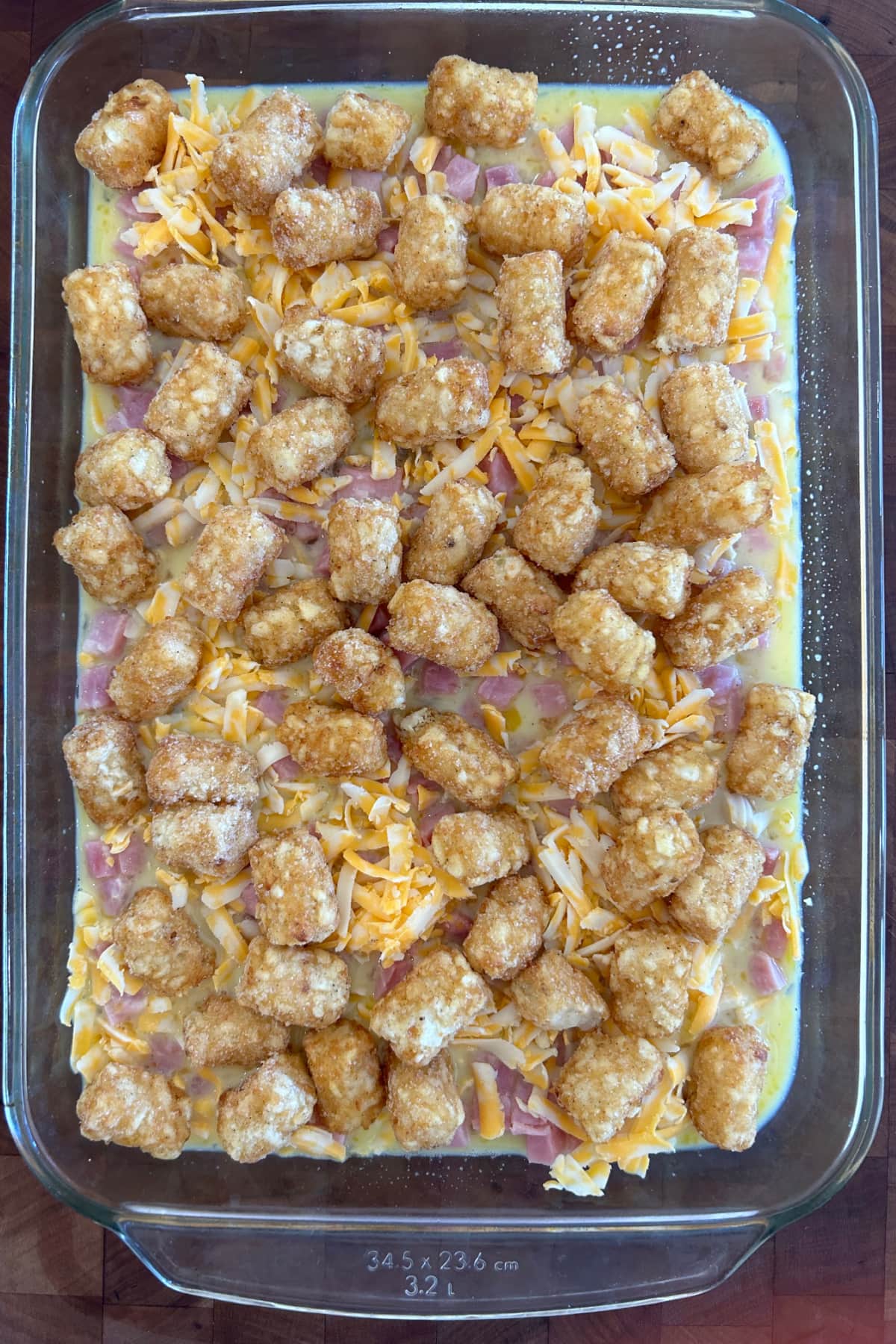 tater tot breakfast casserole ready for oven