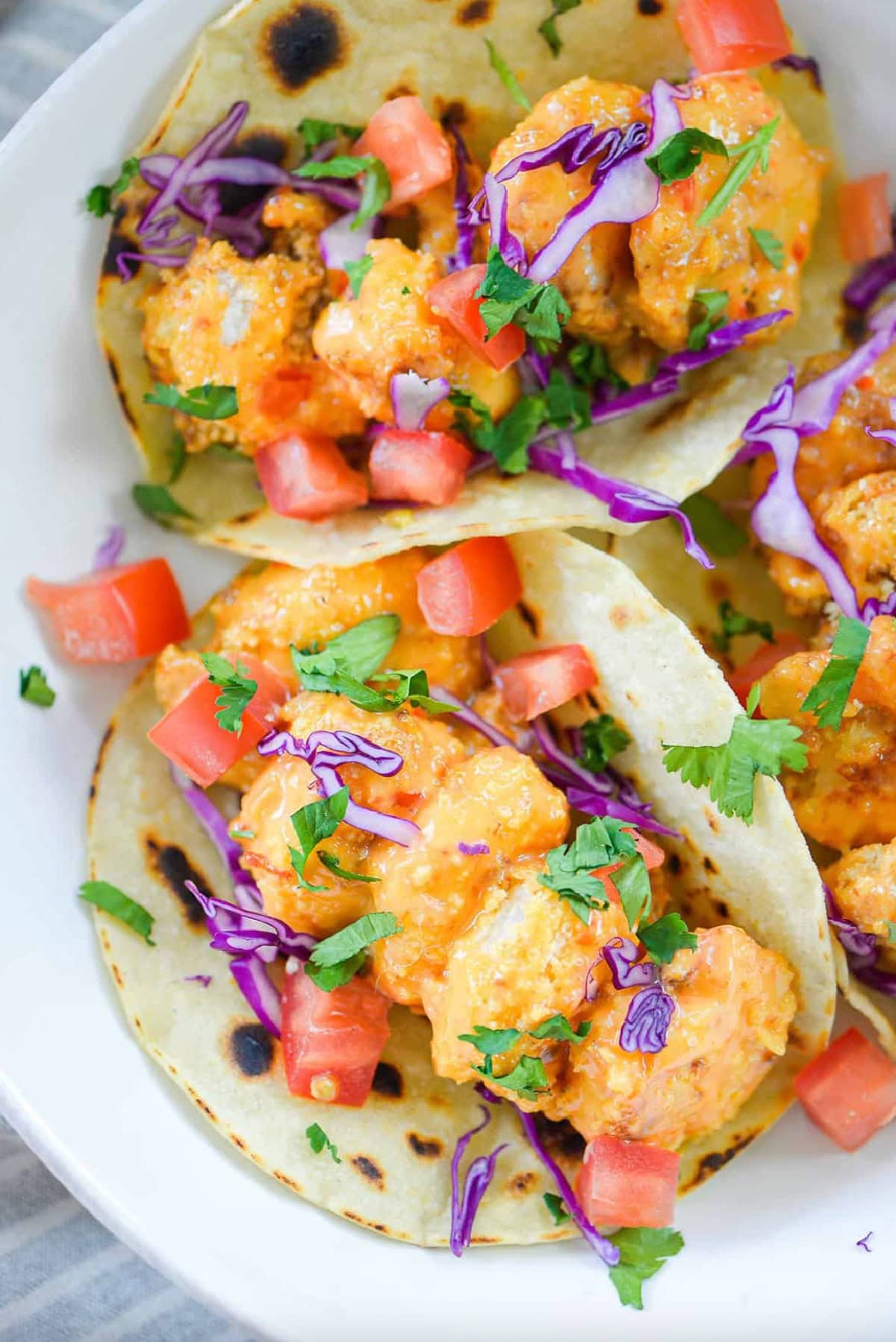 several bang bang shrimp tacos