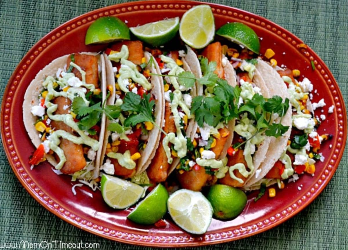 fish tacos with roasted corn salsa on platter