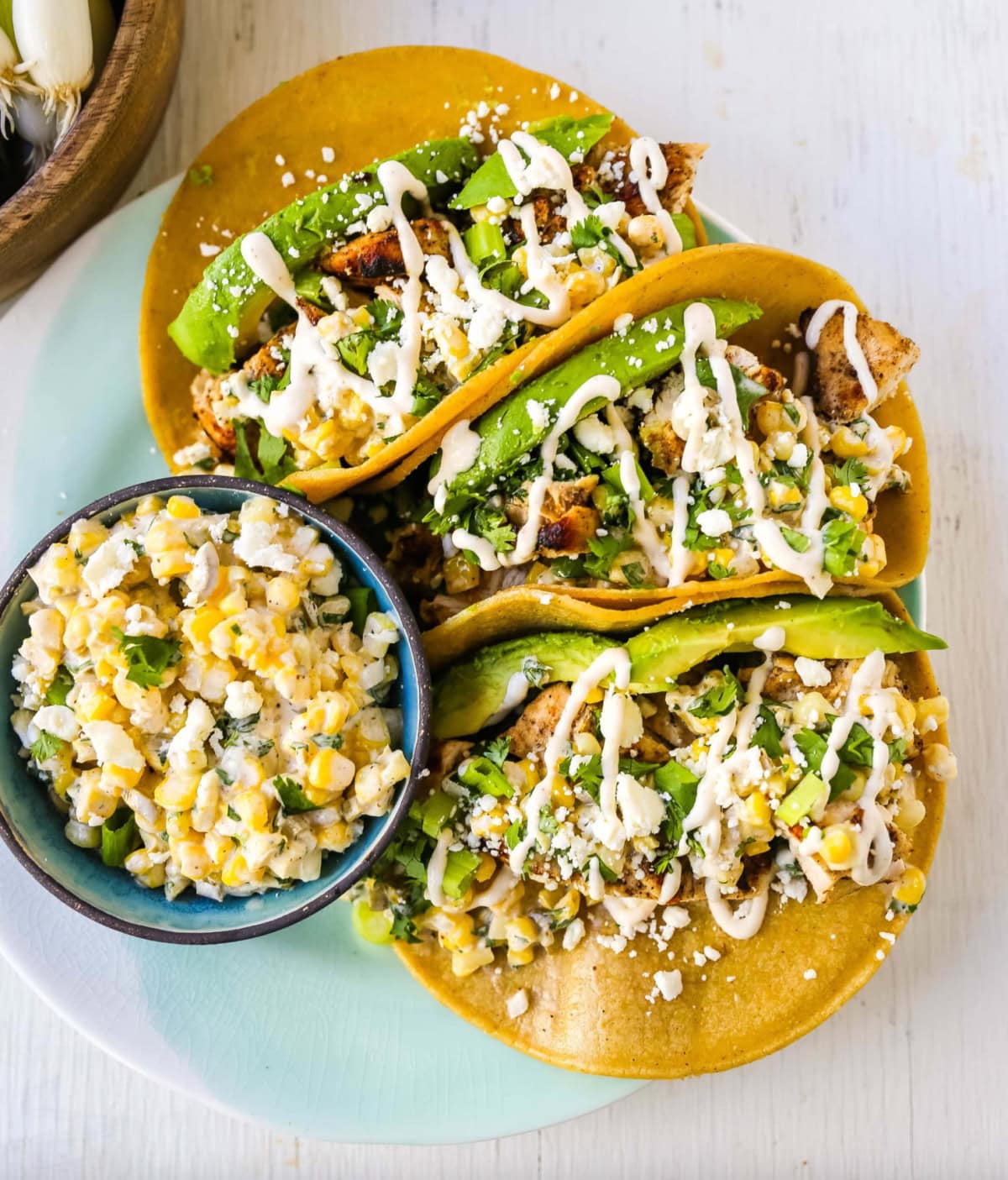 three mexican street corn tacos