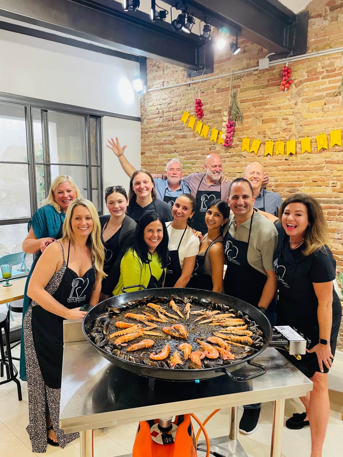 Viking Cruise: Barcelona to Bergen- the Trade Routes of the Middle Ages - a review with lots of photographs on RecipeGirl.com group photo at paella cooking class