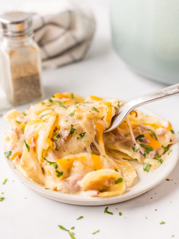 scalloped potatoes with ham on a plate