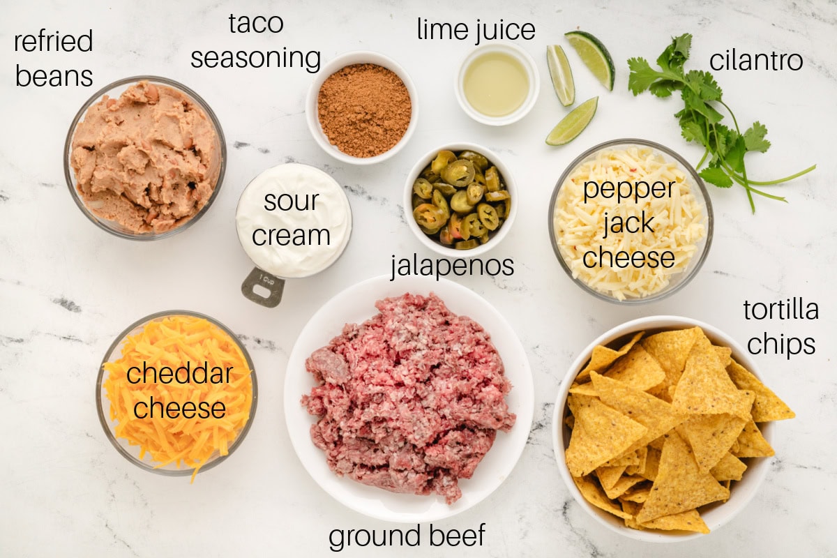 Ground Beef Nachos recipe from RecipeGirl.com ingredients displayed for making ground beef nachos