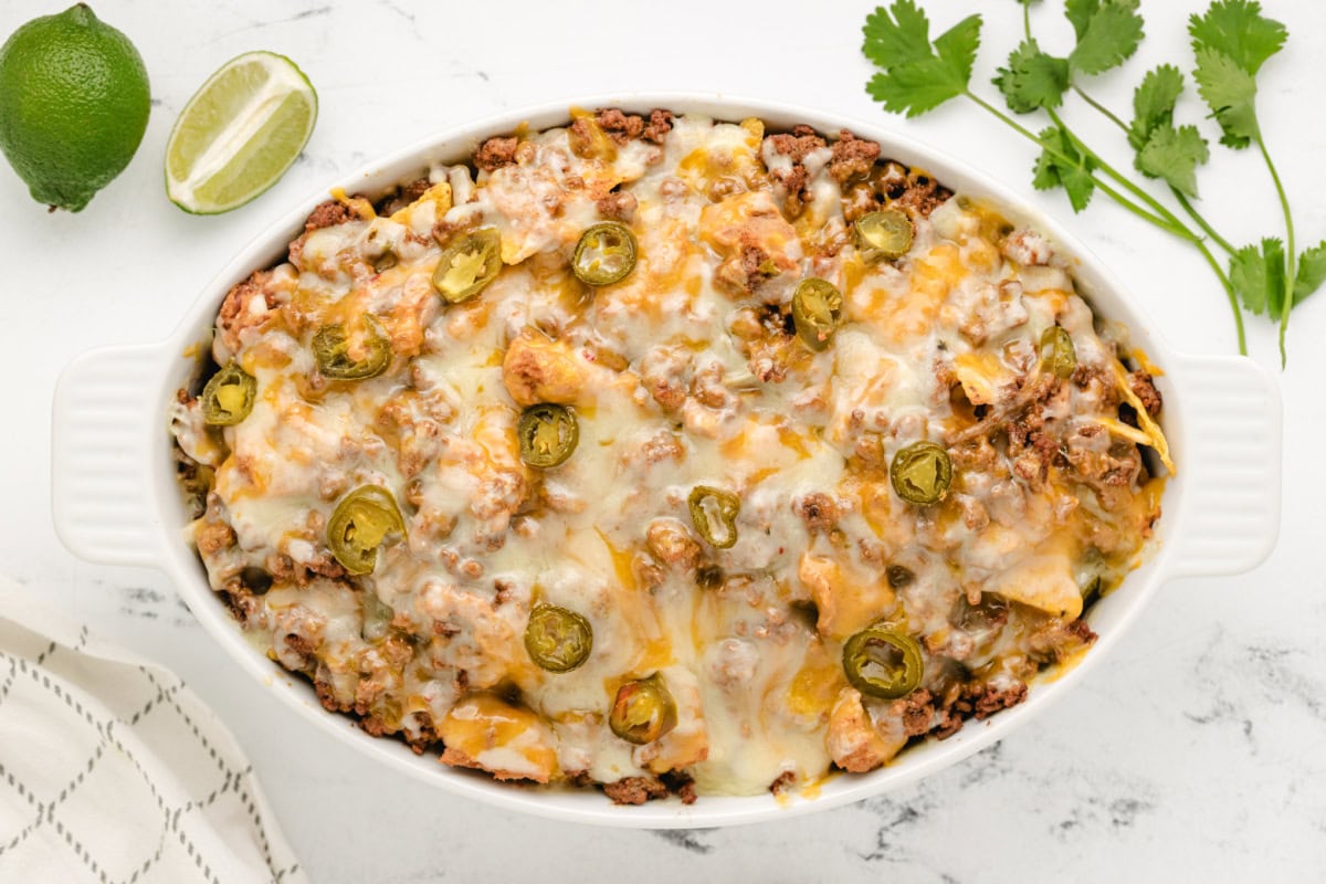 Ground Beef Nachos recipe from RecipeGirl.com dish of melted ground beef nachos