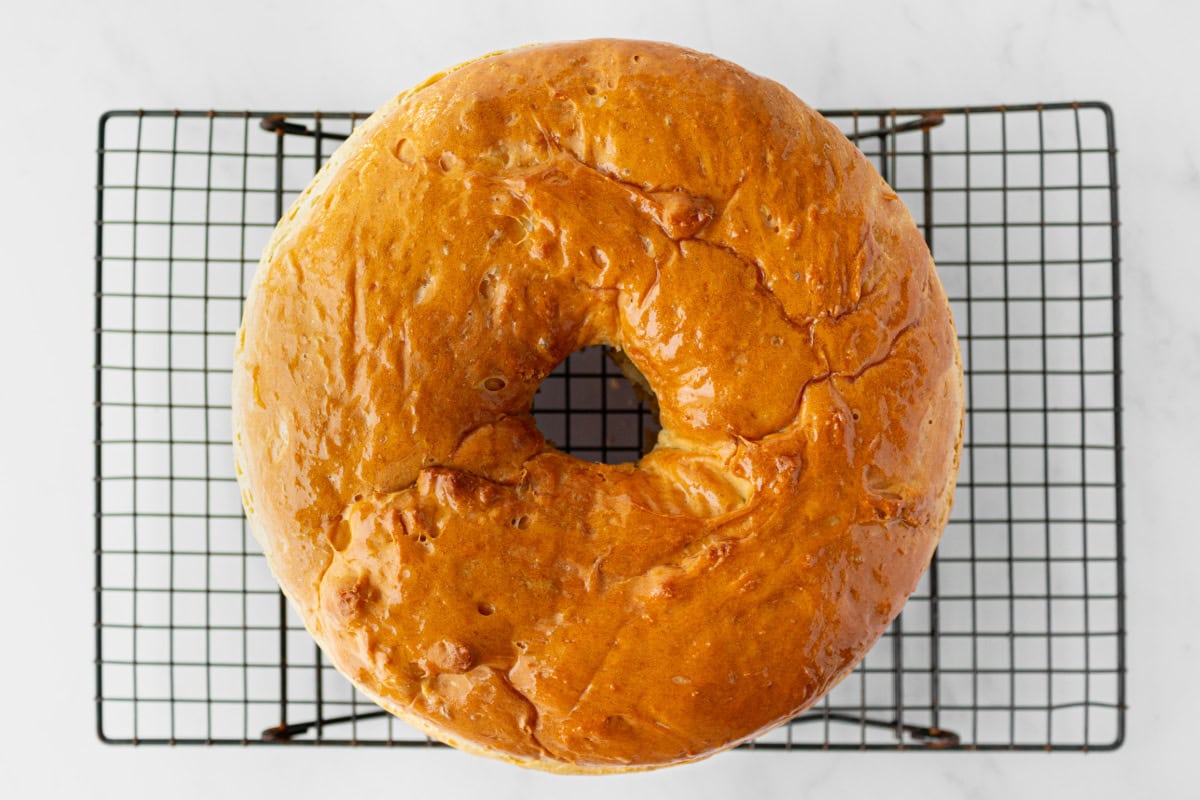 Sally Lunn bread is a soft, slightly sweet old-fashioned favorite yeast bread baked in a tube pan. Perfect for brunch or serving warm with butter and jam! Soft, buttery and so good. overhead shot of sally lunn bread on cooling rack