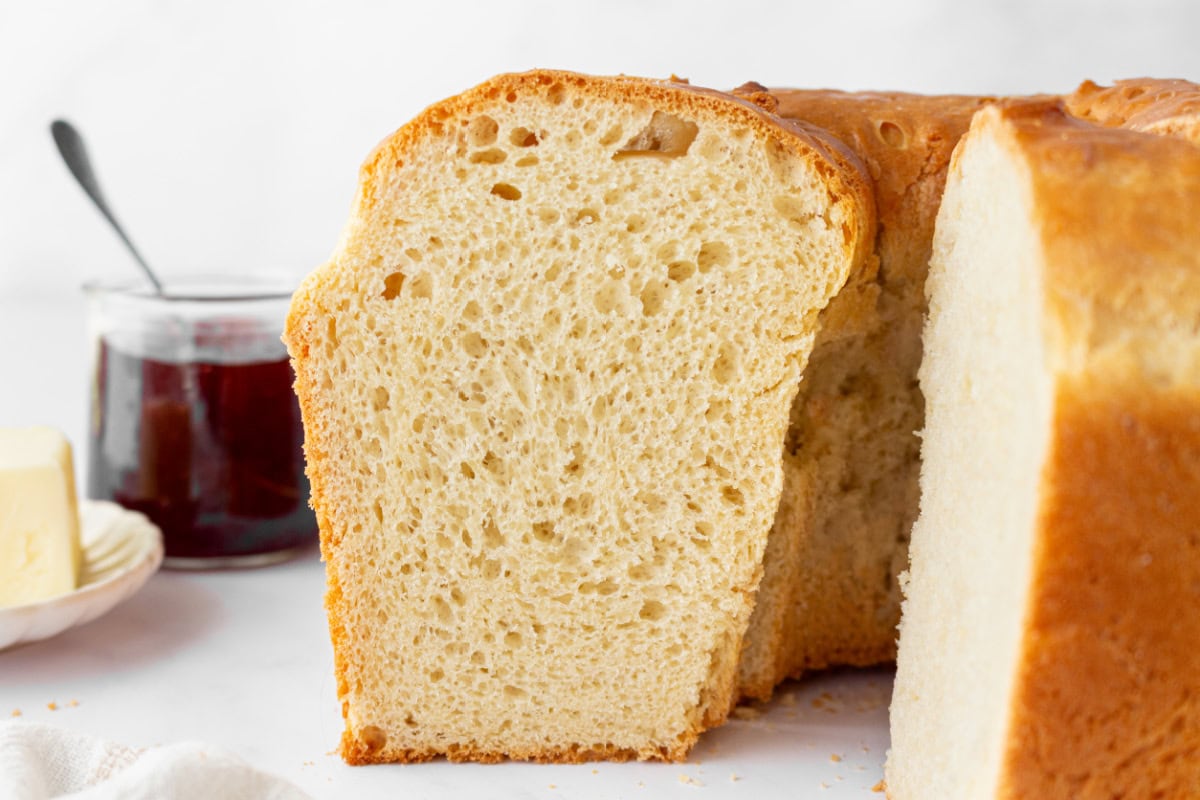 Sally Lunn bread is a soft, slightly sweet old-fashioned favorite yeast bread baked in a tube pan. Perfect for brunch or serving warm with butter and jam! Soft, buttery and so good. loaf of sally lunn