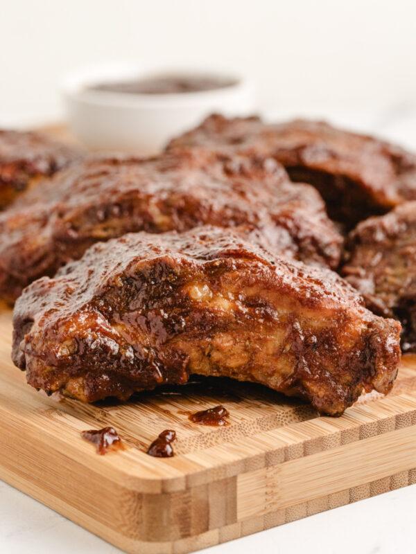 slow cooker baby back ribs on a board