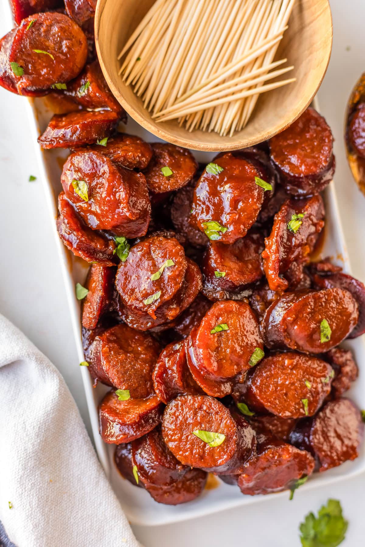 Slow Cooker Kielbasa recipe from RecipeGirl.com : Slow Cooker Candied Kielbasa appetizer slow cooker kielbasa on platter with toothpicks