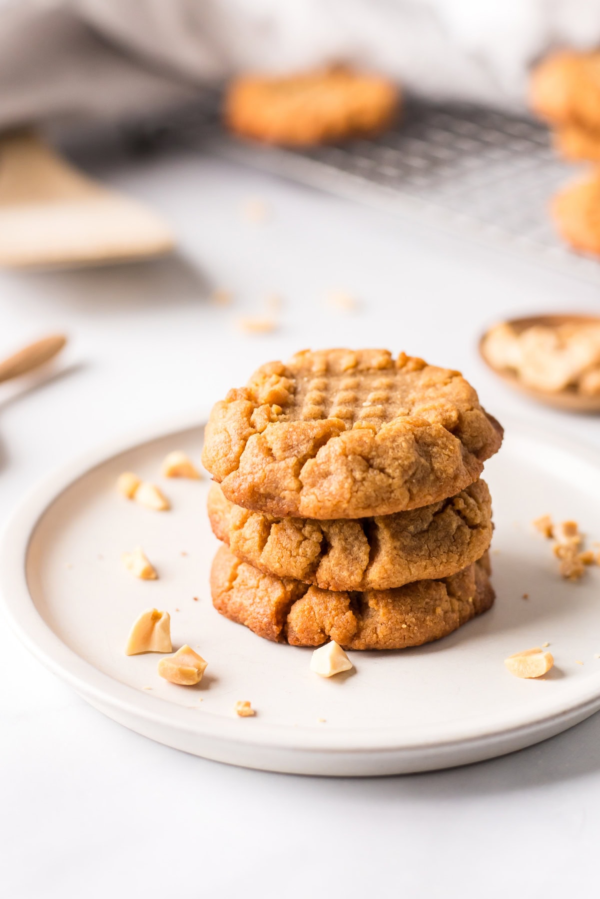 3 Ingredient PB Cookies recipe from RecipeGirl.com : classic, old fashioned peanut butter cookie recipe using just three ingredients three pb cookies stacked on plate