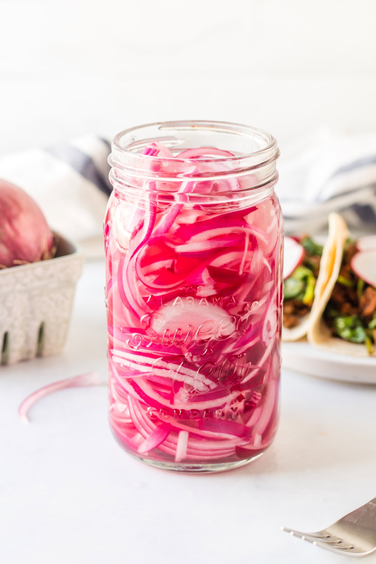 Quick Pickled Red Onions recipe from RecipeGirl.com : easy pickled onions jar of quick pickled red onions