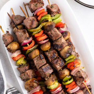 steak kabobs on a platter