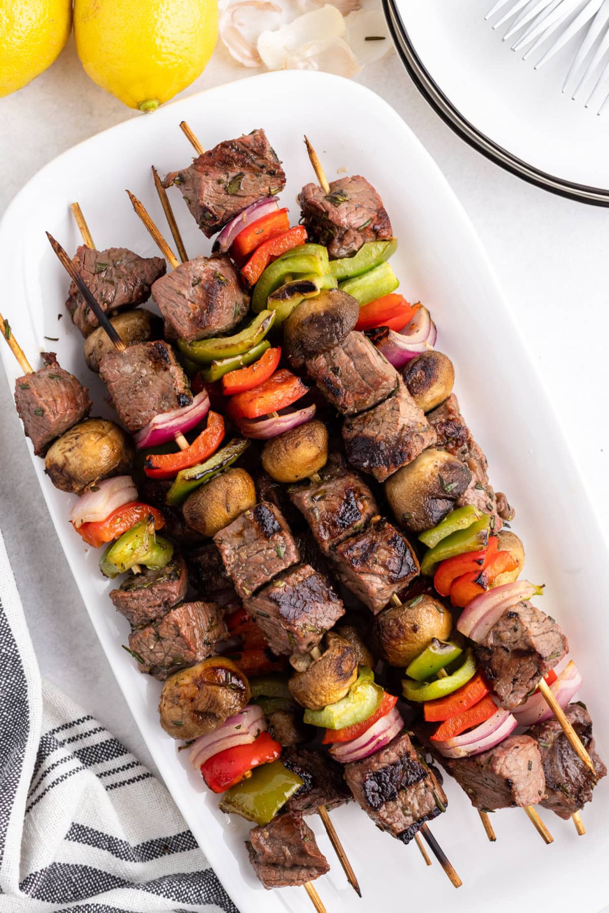 steak kabobs on a platter 