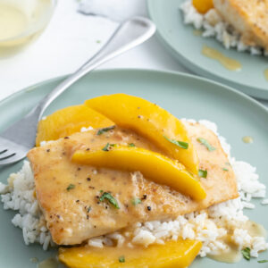 serving of mango mahi mahi on plate