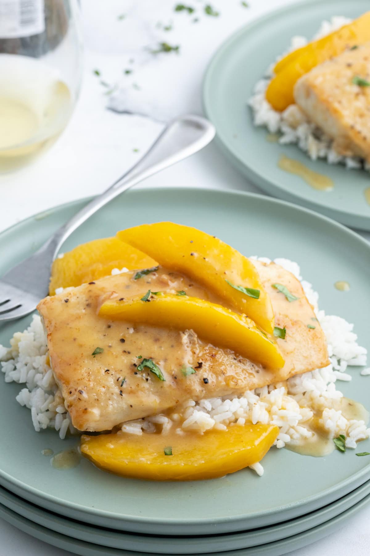 serving of mango mahi mahi on plate