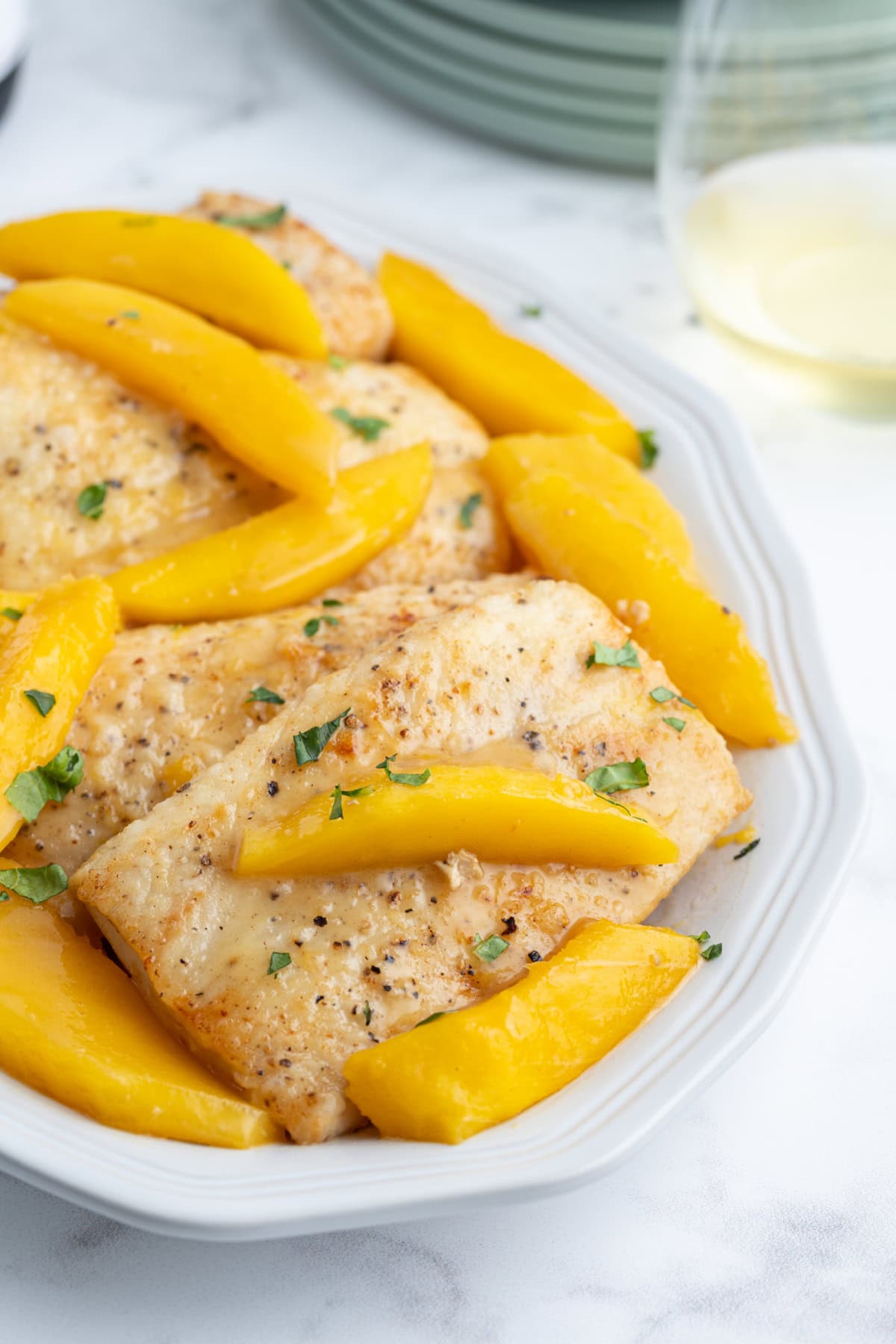 mango mahi mahi on plate