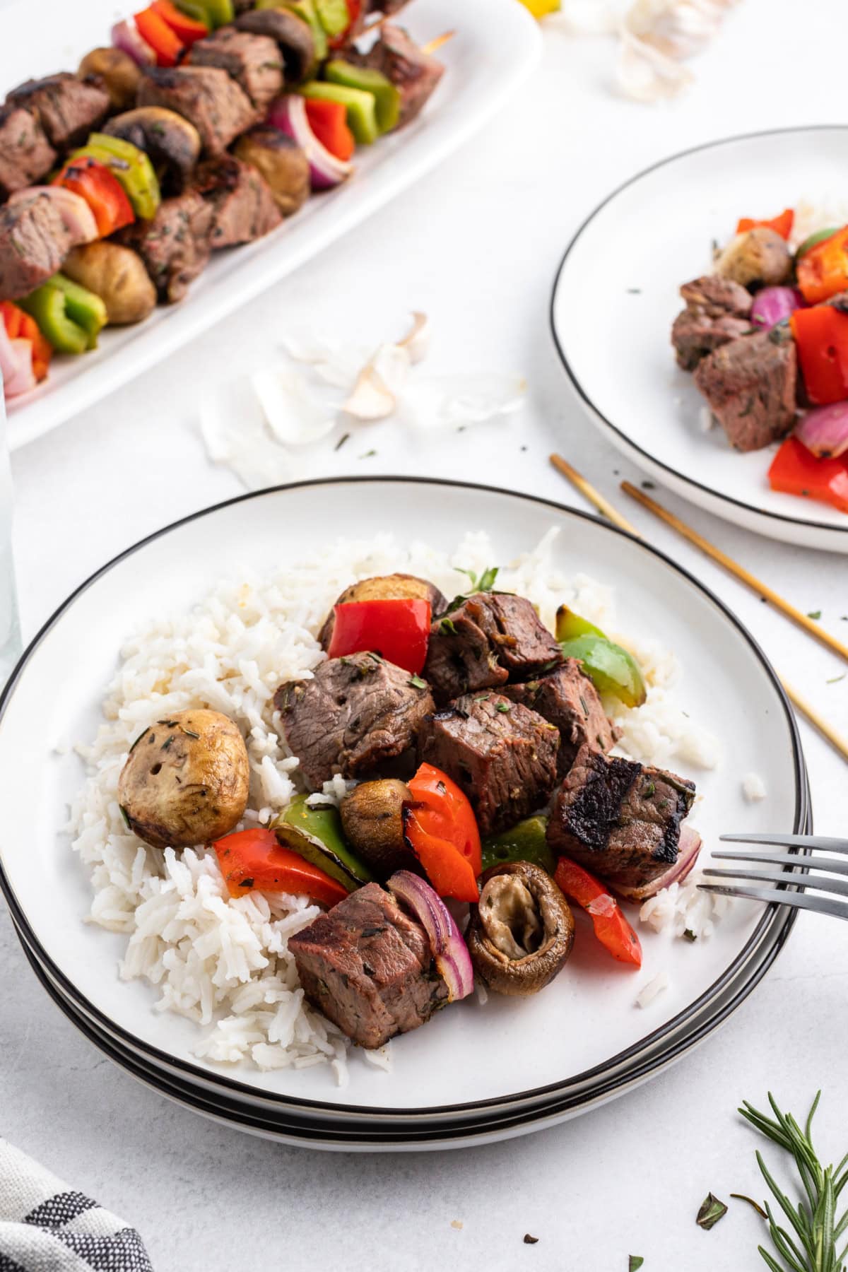 steak kabob taken off skewer and served over rice