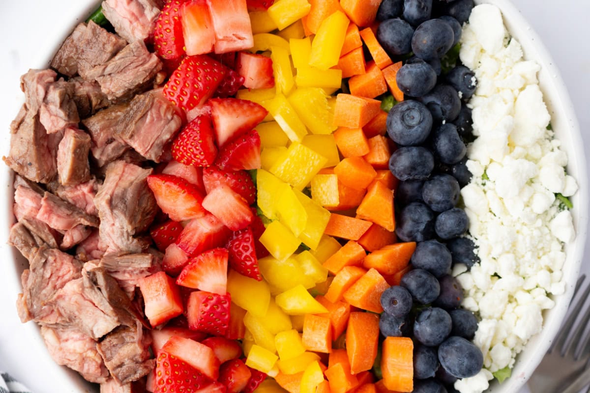 ingredients in bowl for steak salad recipe