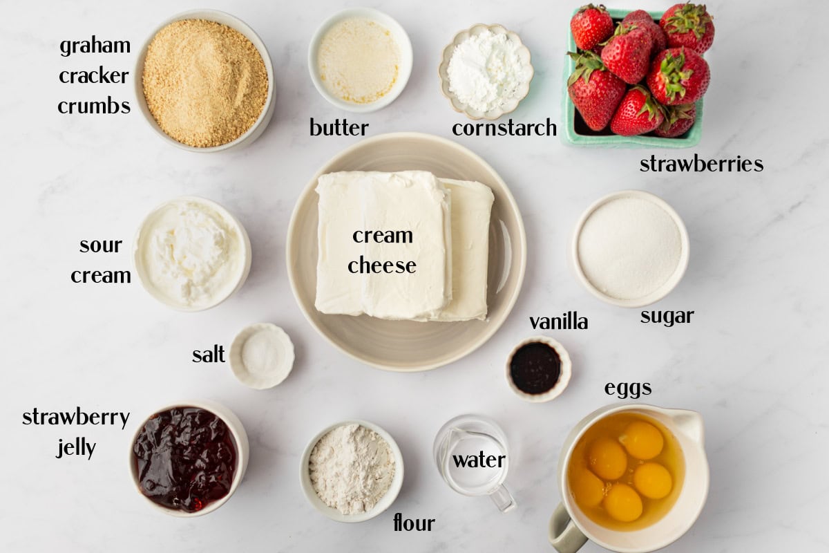 ingredients displayed for making strawberry cheesecake