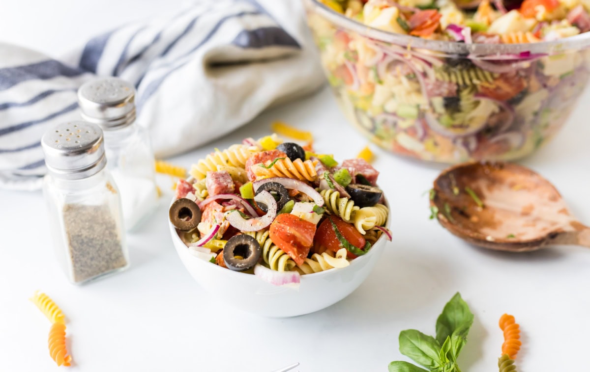 Antipasto Pasta Salad Recipe from RecipeGirl.com serving of antipasto pasta salad in bowl