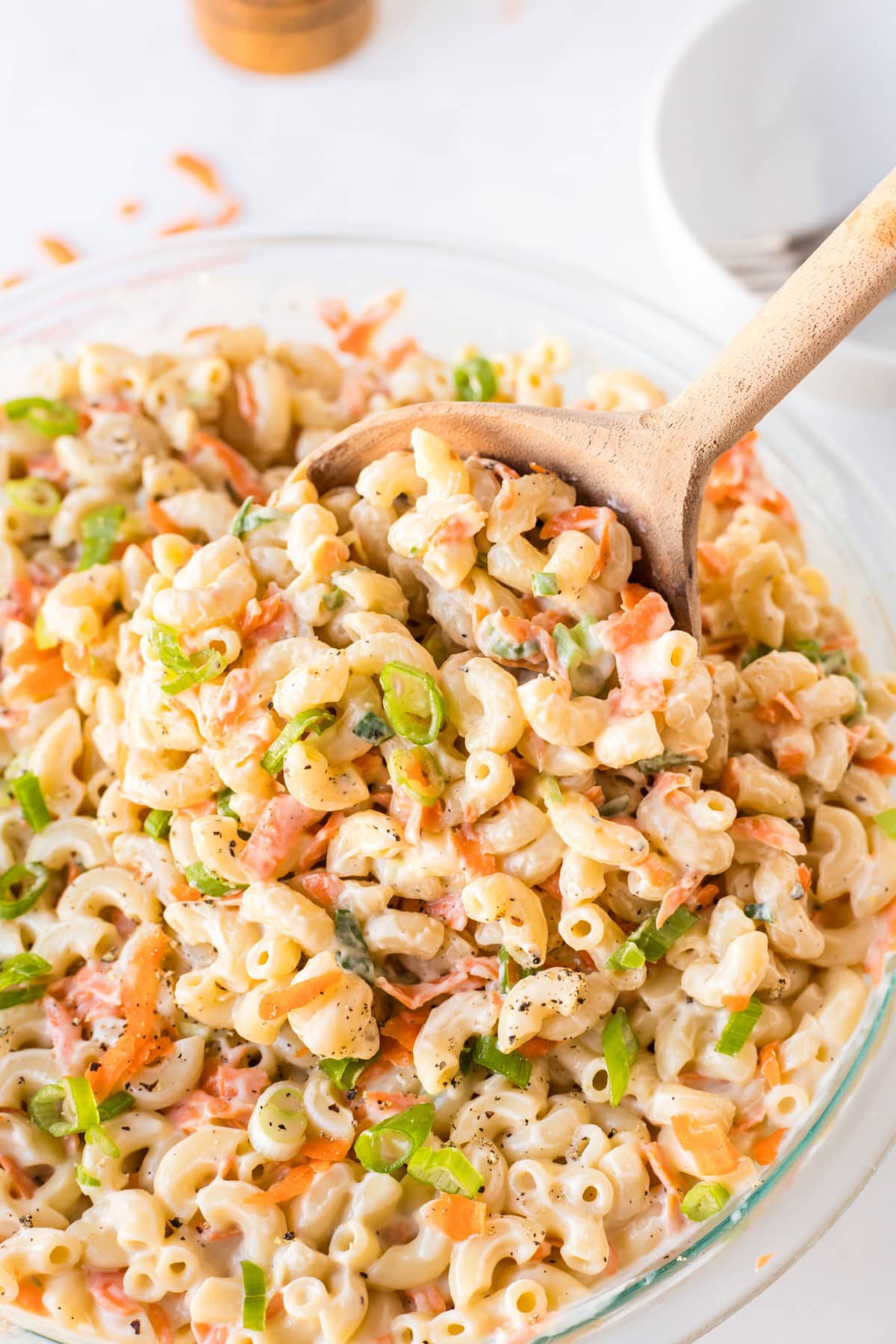 spoon in bowl of hawaiian macaroni salad