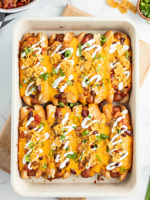 baked chili dogs in a casserole dish