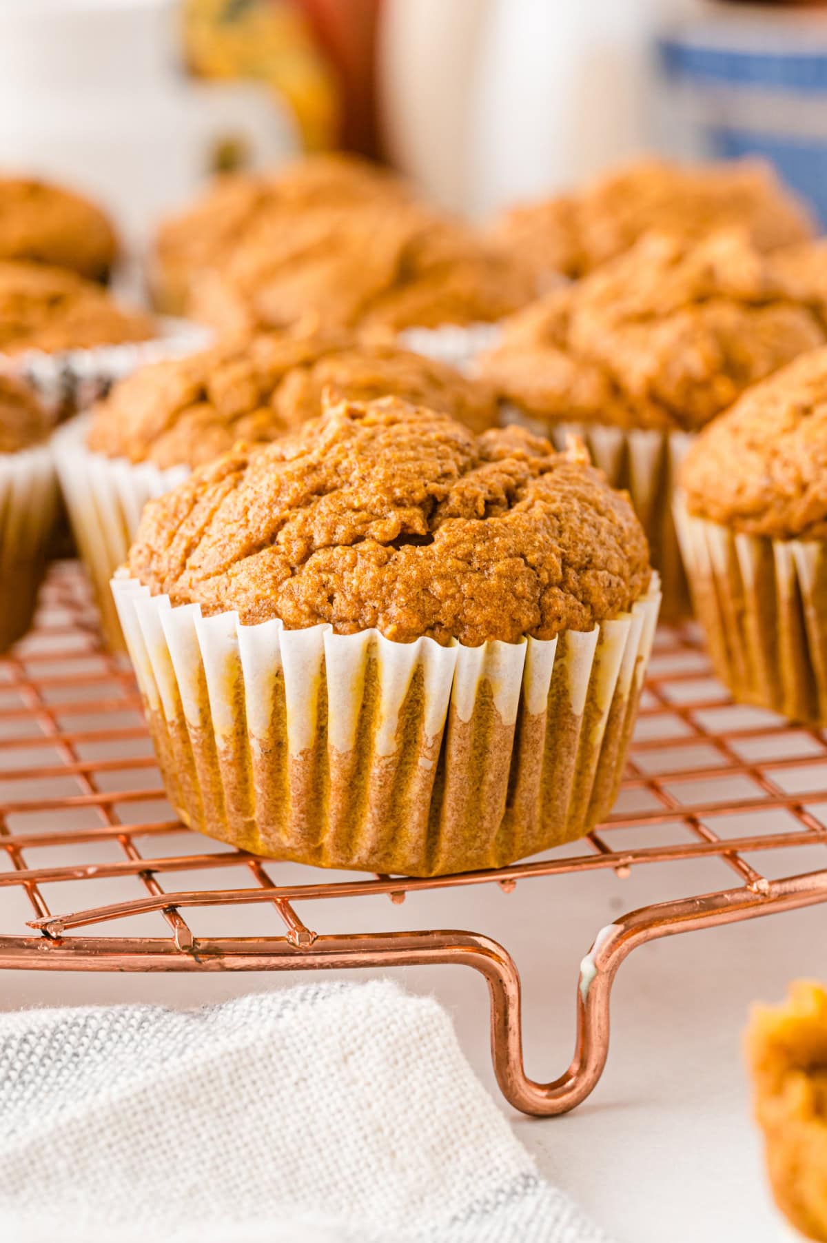 Healthy Pumpkin Muffins recipe from RecipeGirl.com healthy pumpkin muffins on a cooling rack