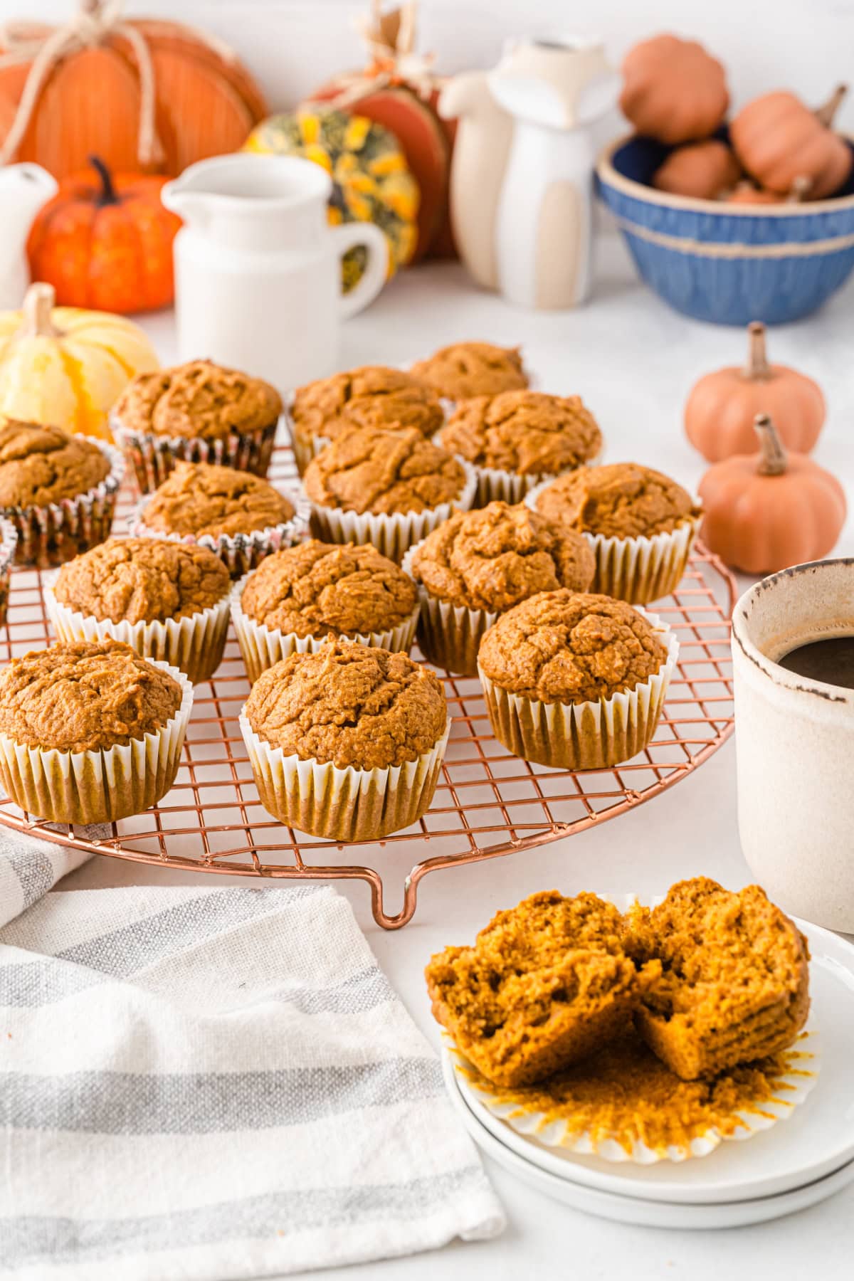 Healthy Pumpkin Muffins recipe from RecipeGirl.com several healthy pumpkin muffins on a rack