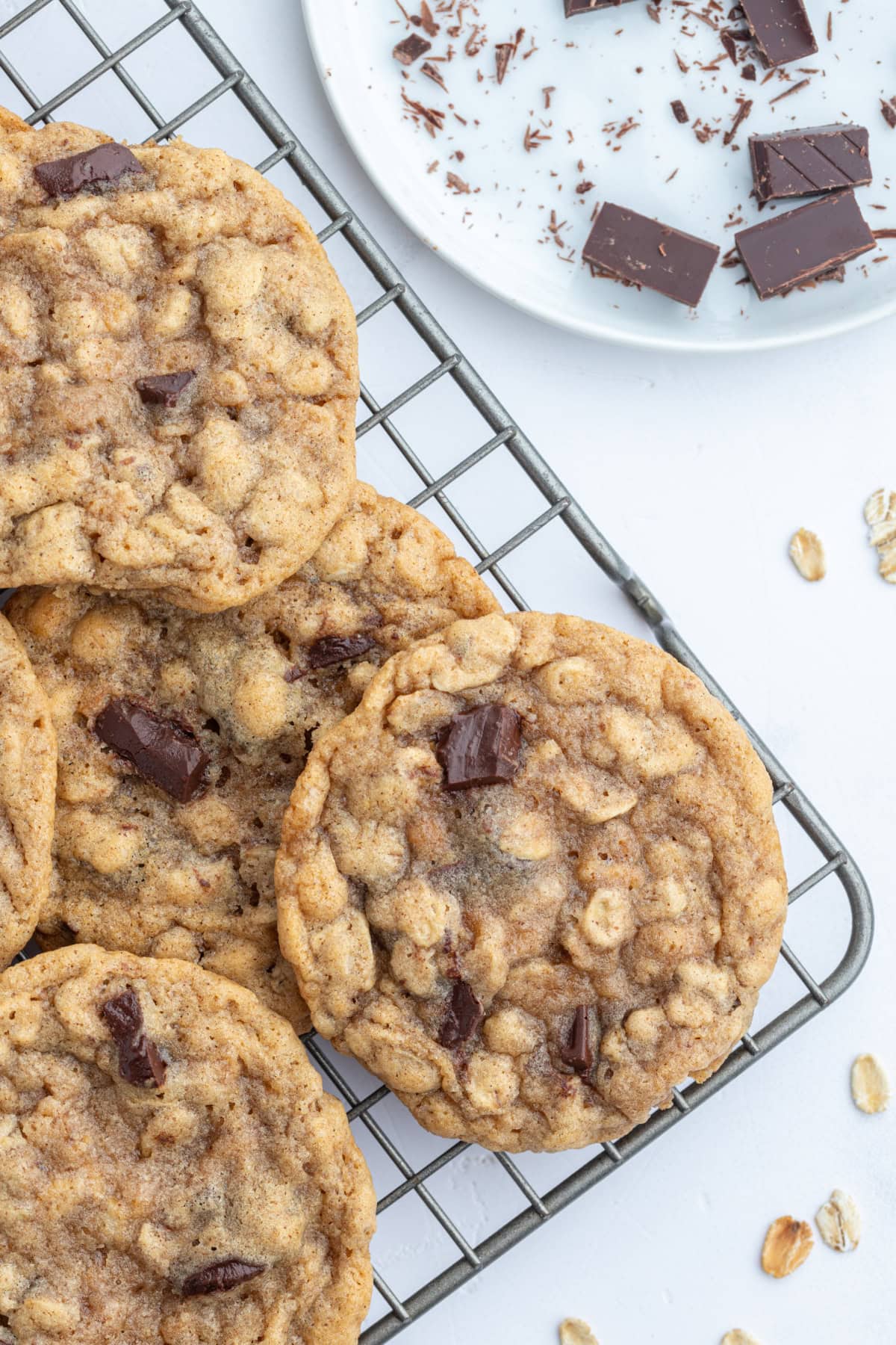One Bowl Oatmeal Chocolate Chunk Cookies recipe from RecipeGIrl.com oatmeal chocolate chunk cookies on a cooling rack
