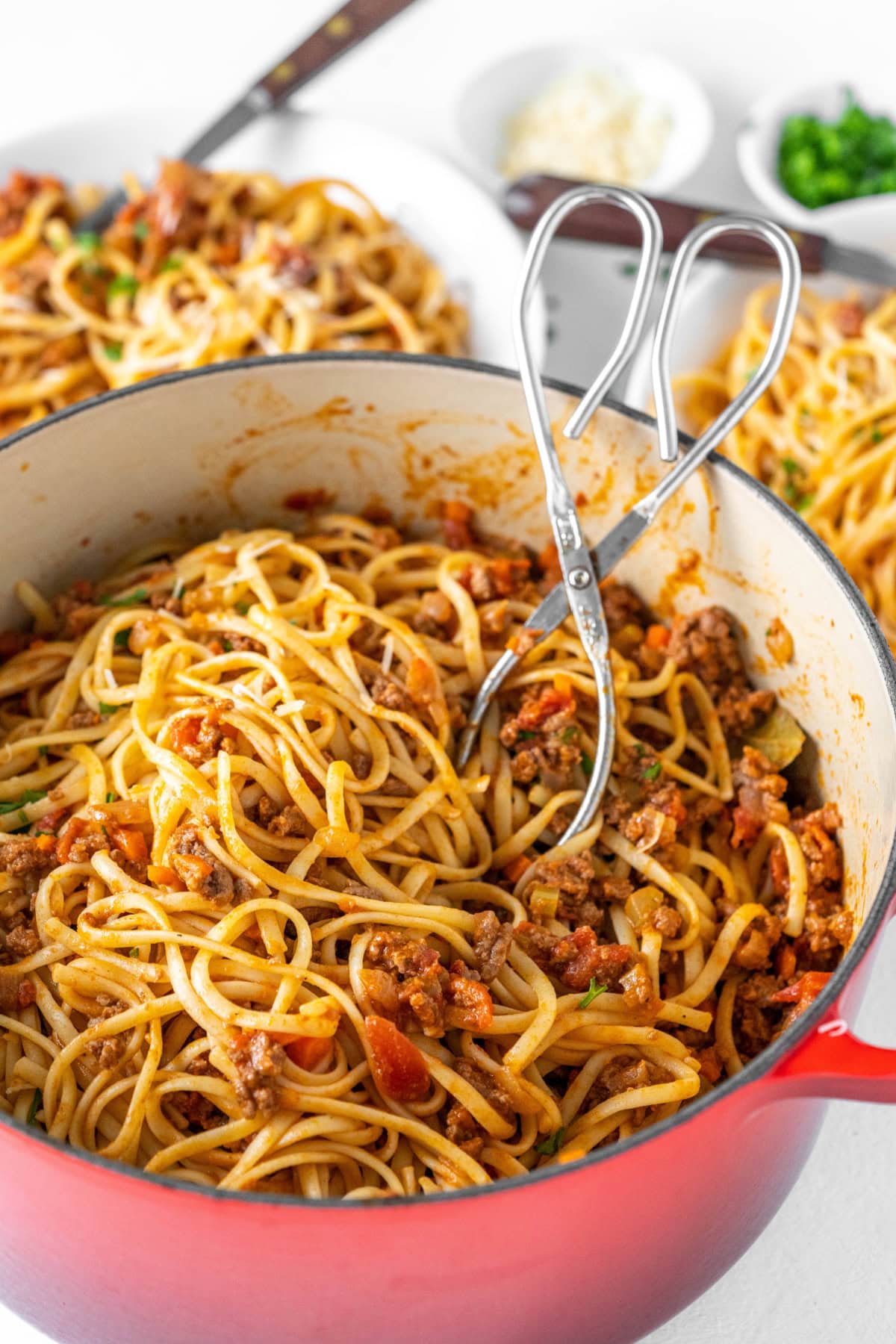 pot of linguine with bolognese sauce