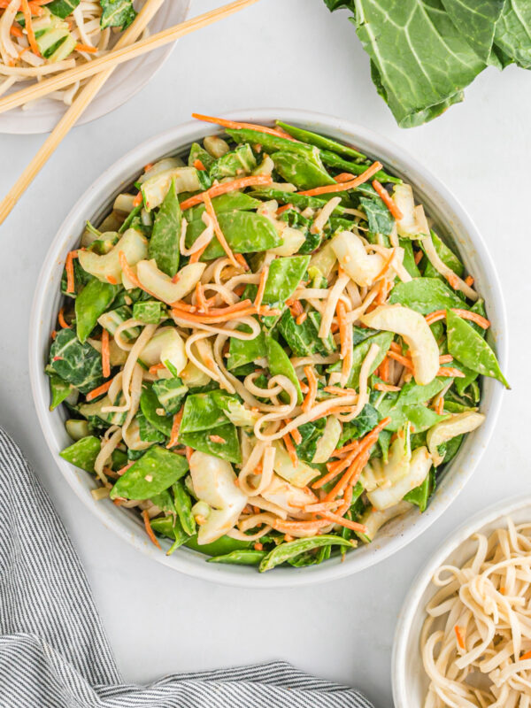 big bowl of spicy peanut noodles and asian vegetables