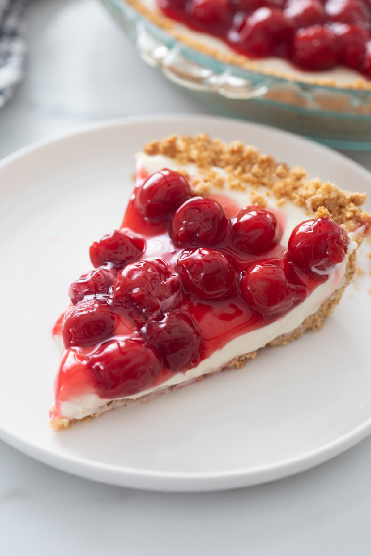 slice of cherry cream cheese pie