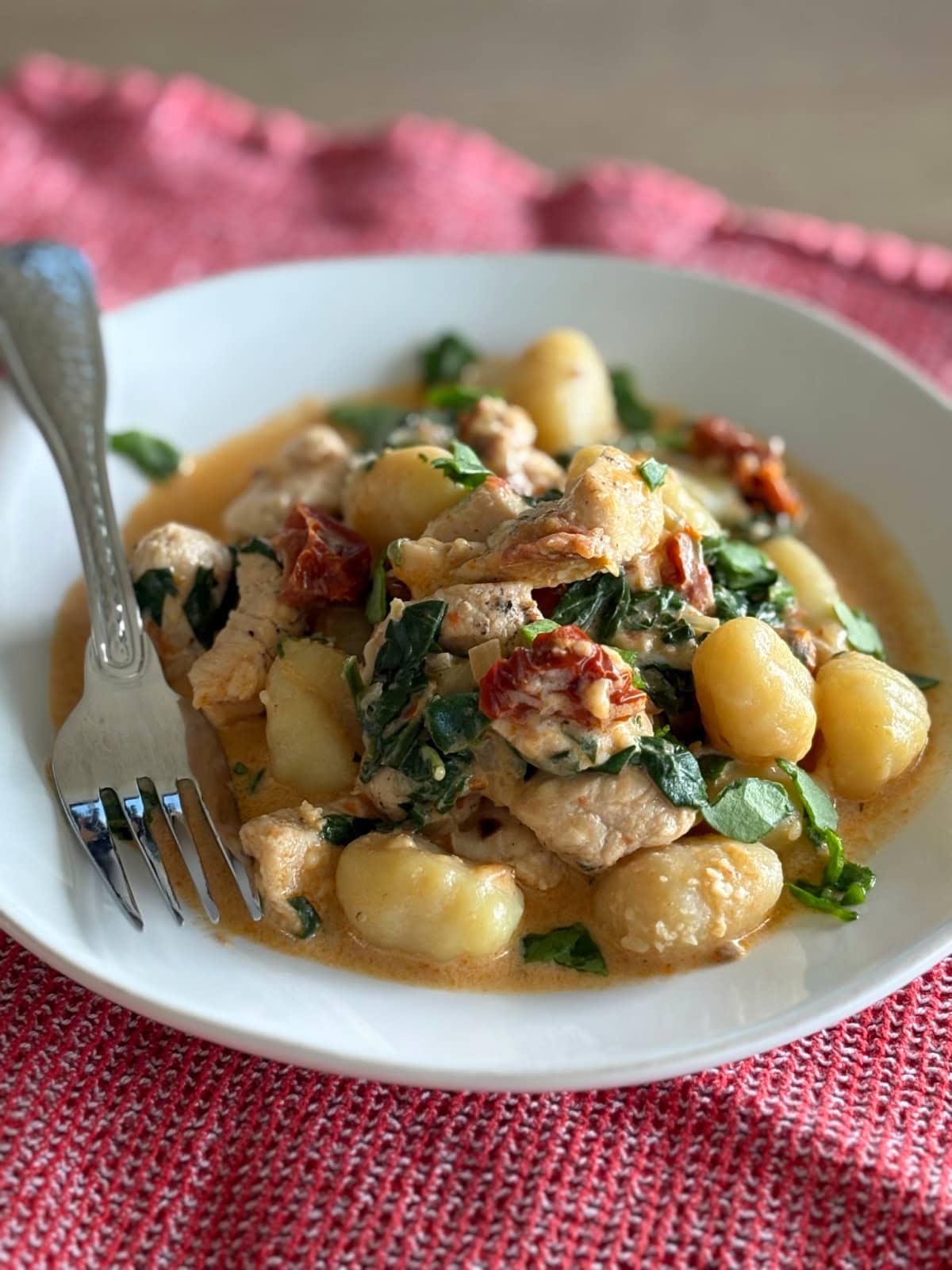 serving of marry me chicken gnocchi on plate