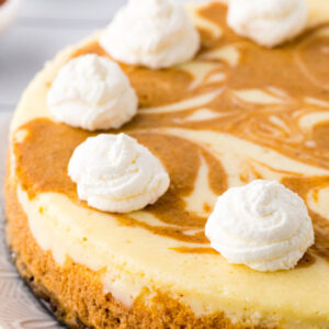 pinterest image for pumpkin swirl cheesecake