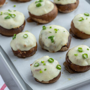 boursin stuffed mushrooms on a baking sheet