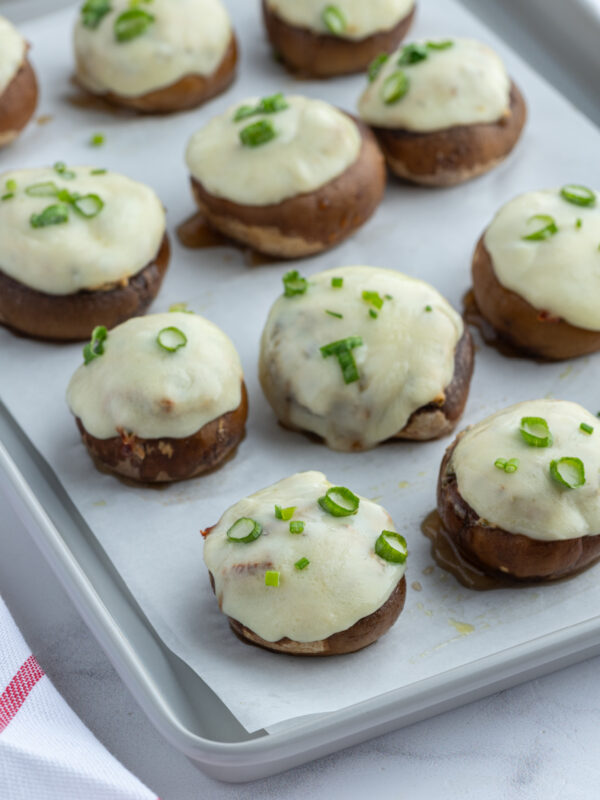 boursin stuffed mushrooms on a baking sheet