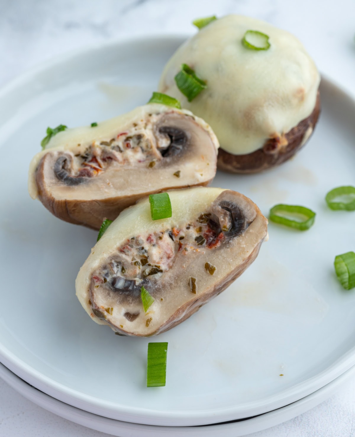 boursin stuffed mushroom cut open to see the inside