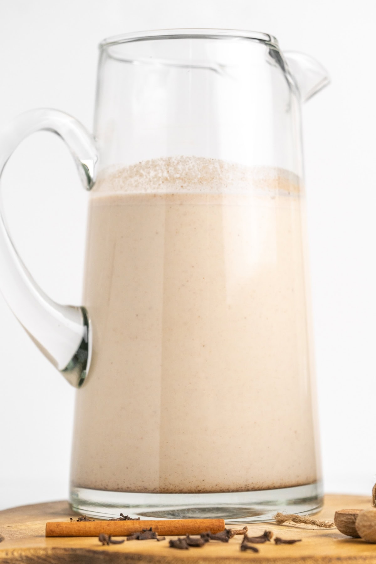 This easy, authentic Puerto Rican Coquito is rich, creamy, spiced, and perfect for Christmas! Made with coconut milk, sweetened condensed milk, and rum — just blend and chill. pitcher of coquito