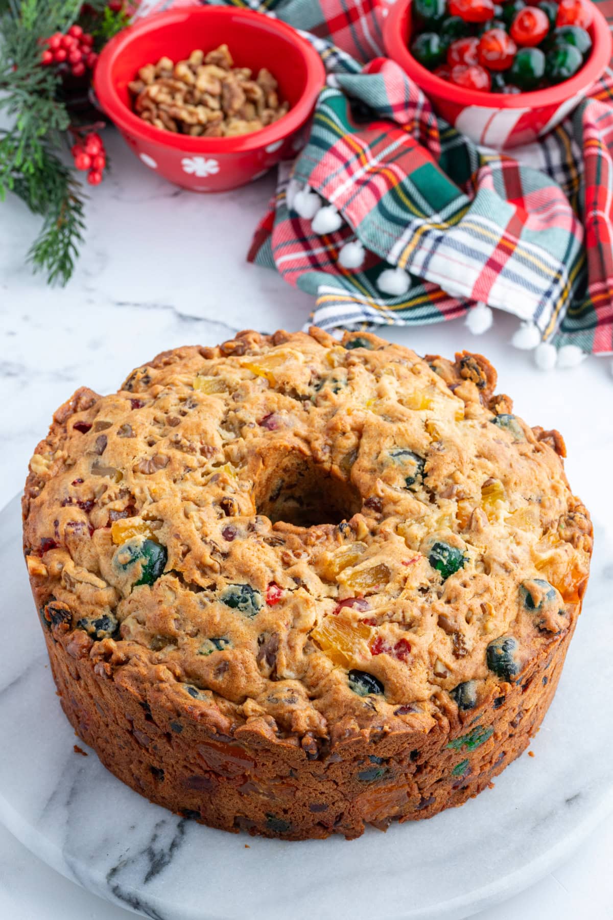 This homemade fruitcake is rich, moist, and loaded with candied fruit and nuts. A traditional Christmas dessert that bakes beautifully and slices perfectly every time. fruitcake