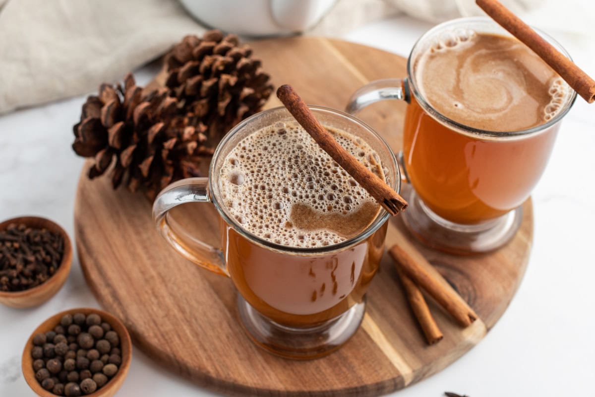 two mugs of hot buttered rum