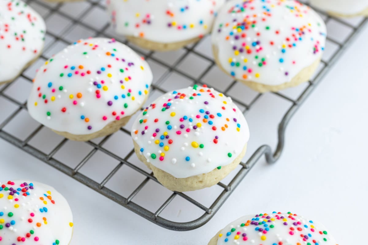 iced italian christmas cookies on a cooling rack