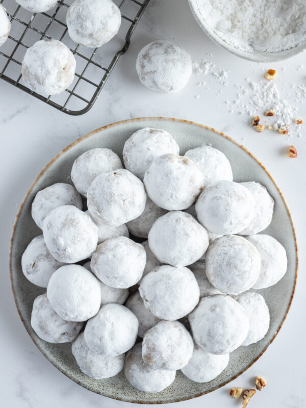 overhead shot of a plate of pfeffernusse cookies