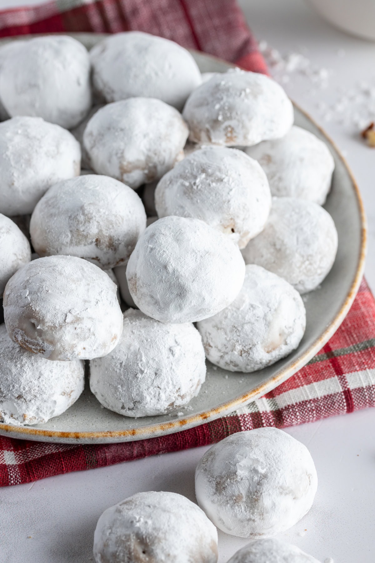 pfeffernusse stacked on a plate