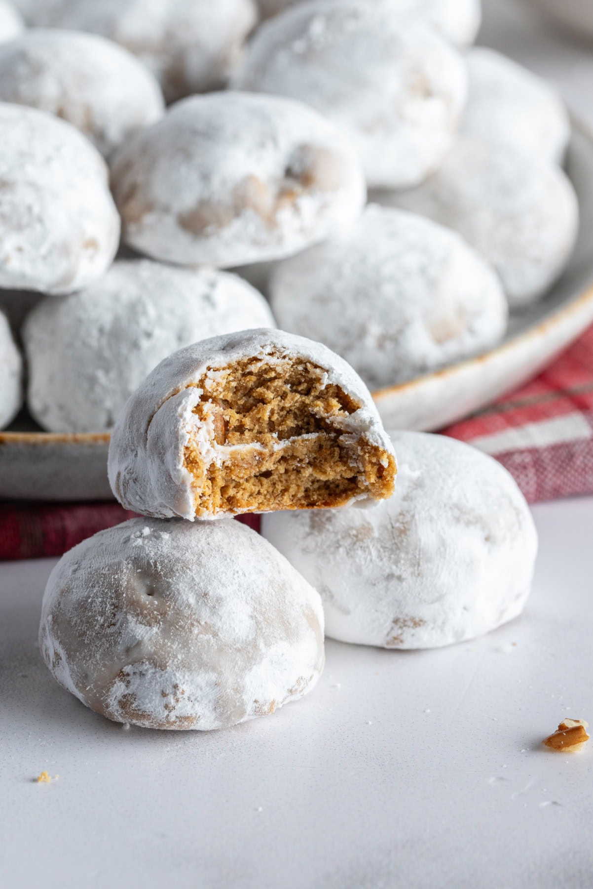 pfeffernusse cookies one with bite taken out of it