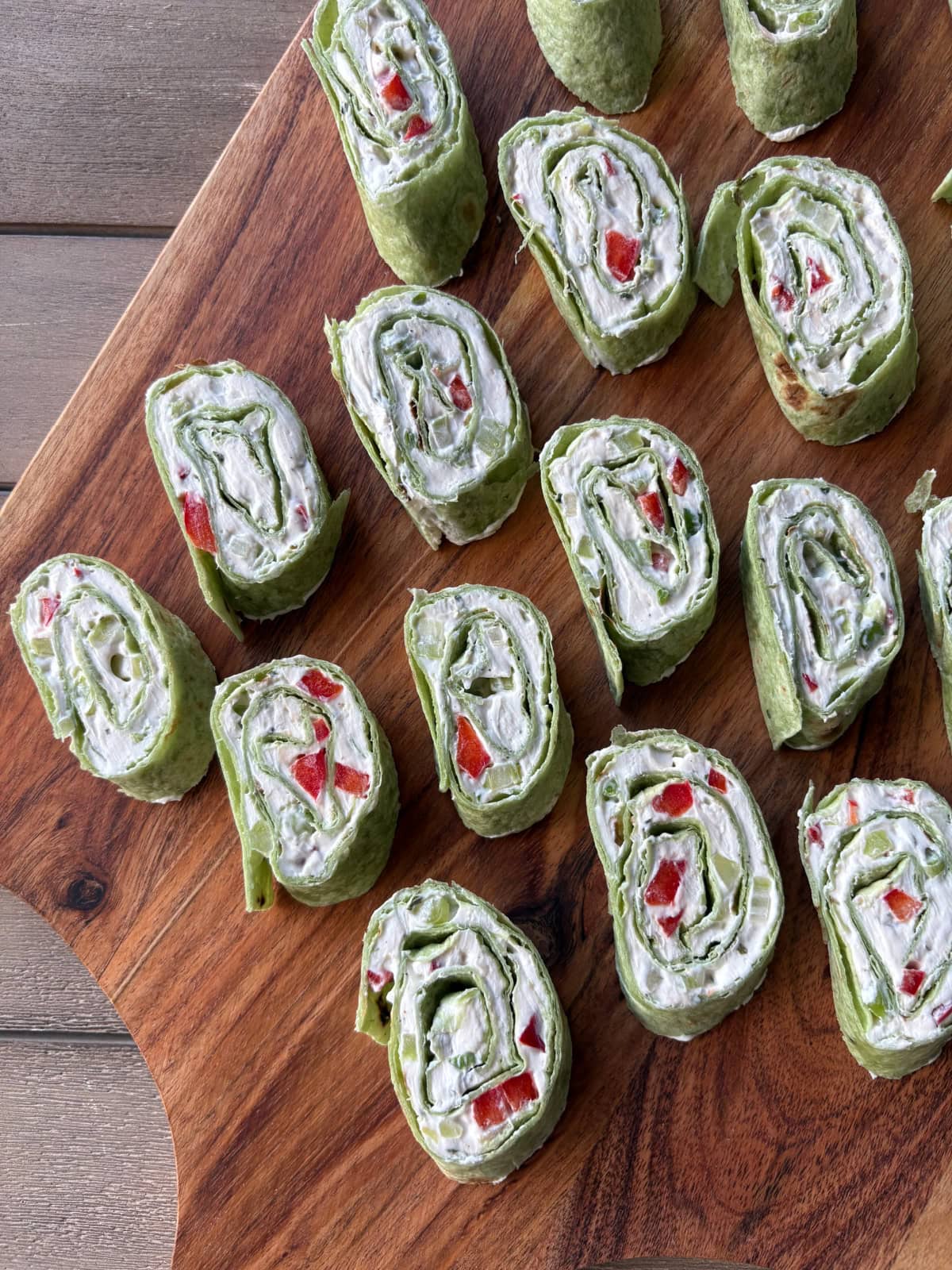 pinwheel appetizers on a board