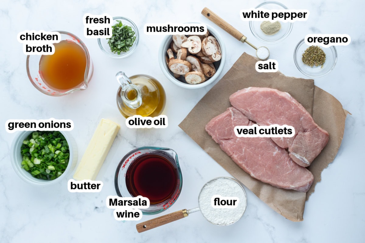 Tender pan-seared veal simmered in a glossy Marsala wine sauce with mushrooms and green onions. This easy Veal Marsala is elegant, flavorful, and perfect for entertaining or weeknight comfort food. ingredients displayed for making veal marsala