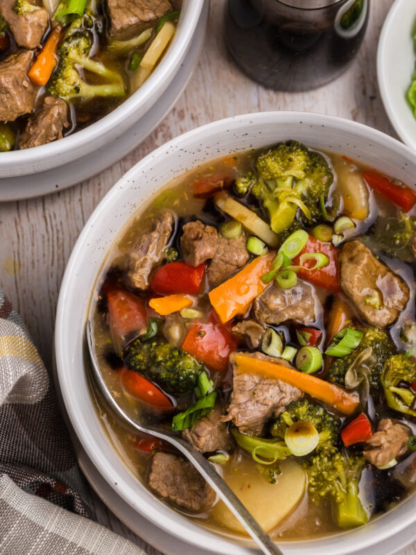 white bowls of beef and vegetable stew