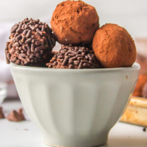 chocolate cocoa truffles in a white bowl