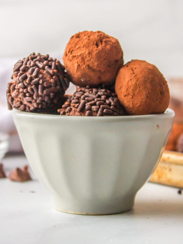 chocolate cocoa truffles in a white bowl