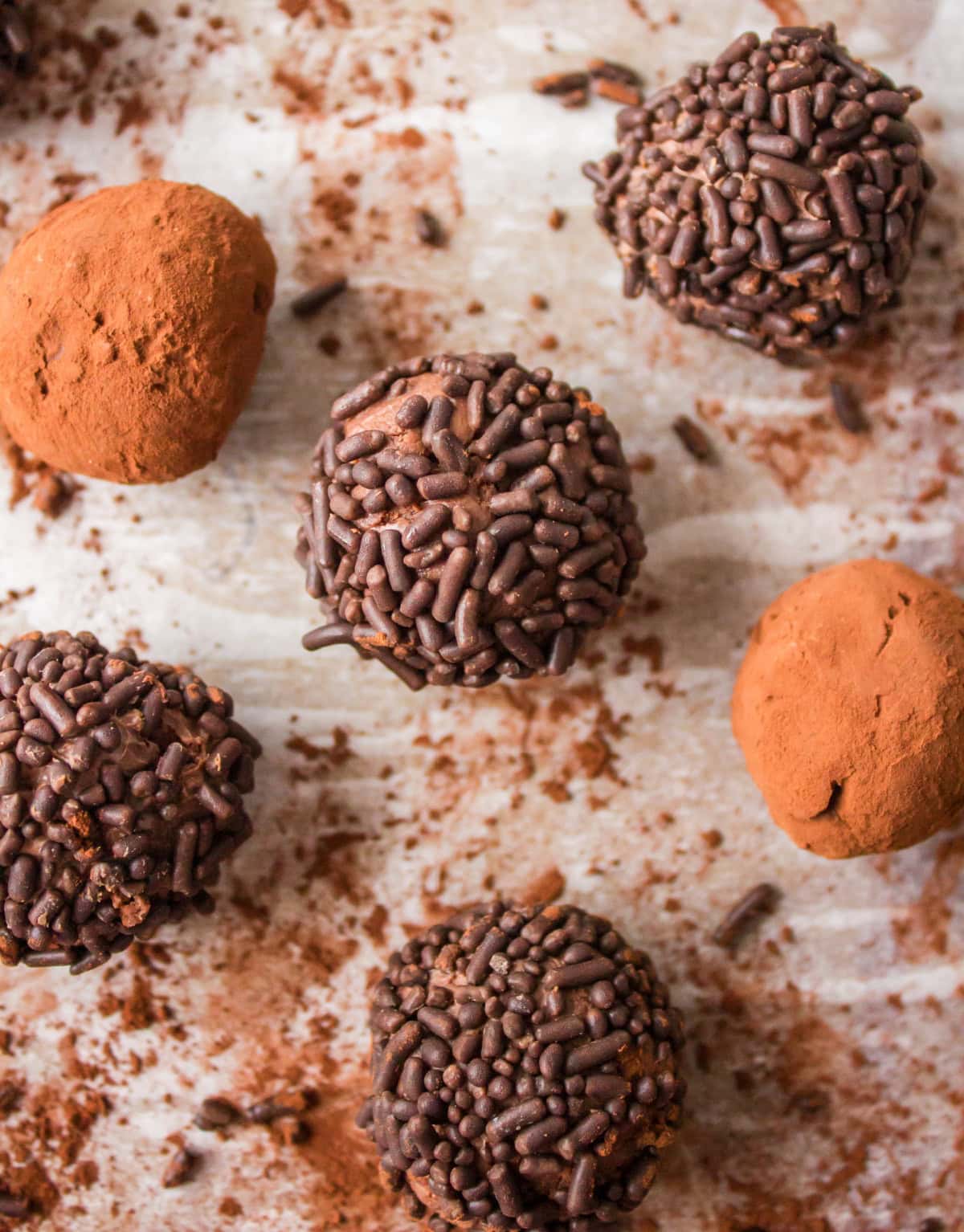 chocolate cocoa truffles on a baking sheet