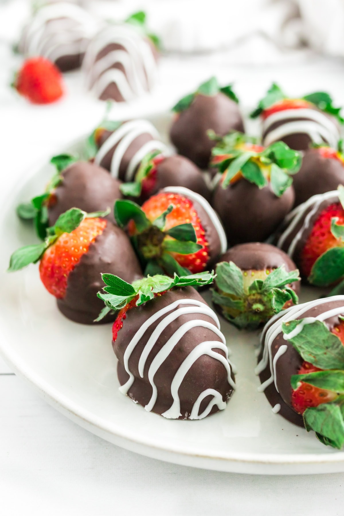 easy chocolate covered strawberries on a plate